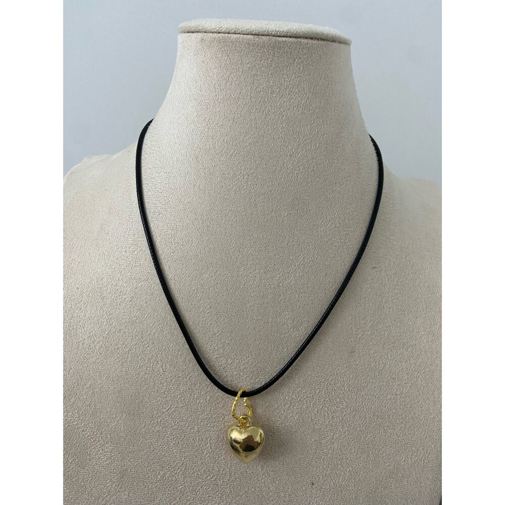 Gold tone puffed heart necklace